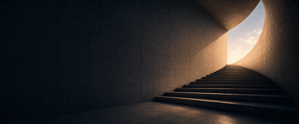 Sunlight streaming through architectural concrete stairs
